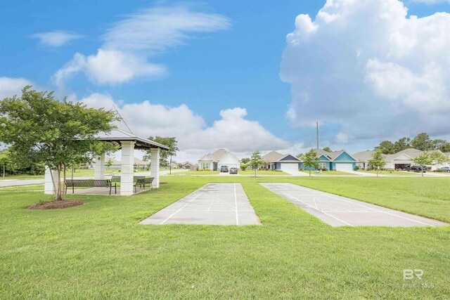 394 Haise Ln, Gulf Shores, AL 36542 - view of home's community featuring a residential view, a yard, shuffleboard, and a gazebo