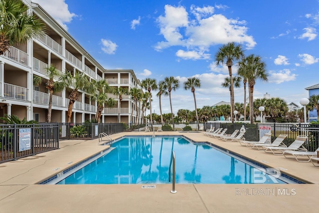 view of swimming pool featuring a patio