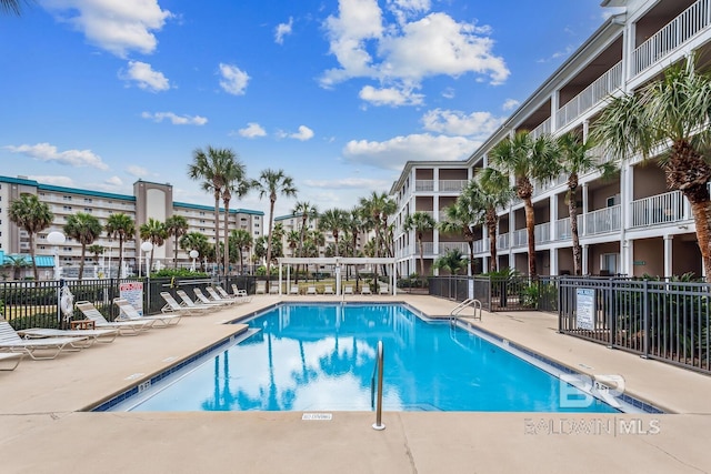 view of pool featuring a patio