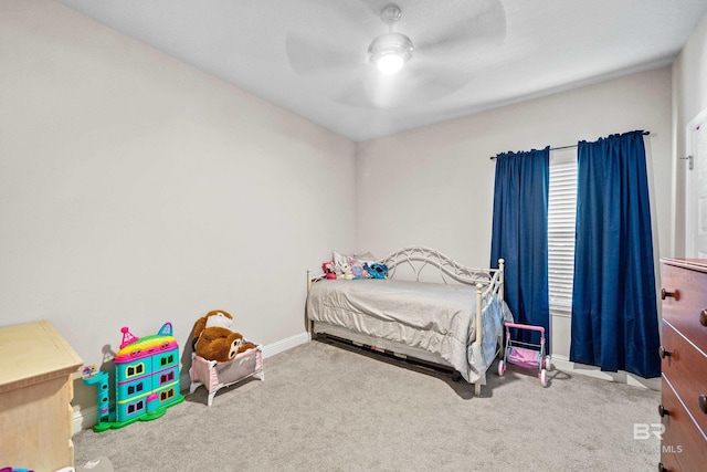 bedroom with carpet floors, baseboards, and ceiling fan