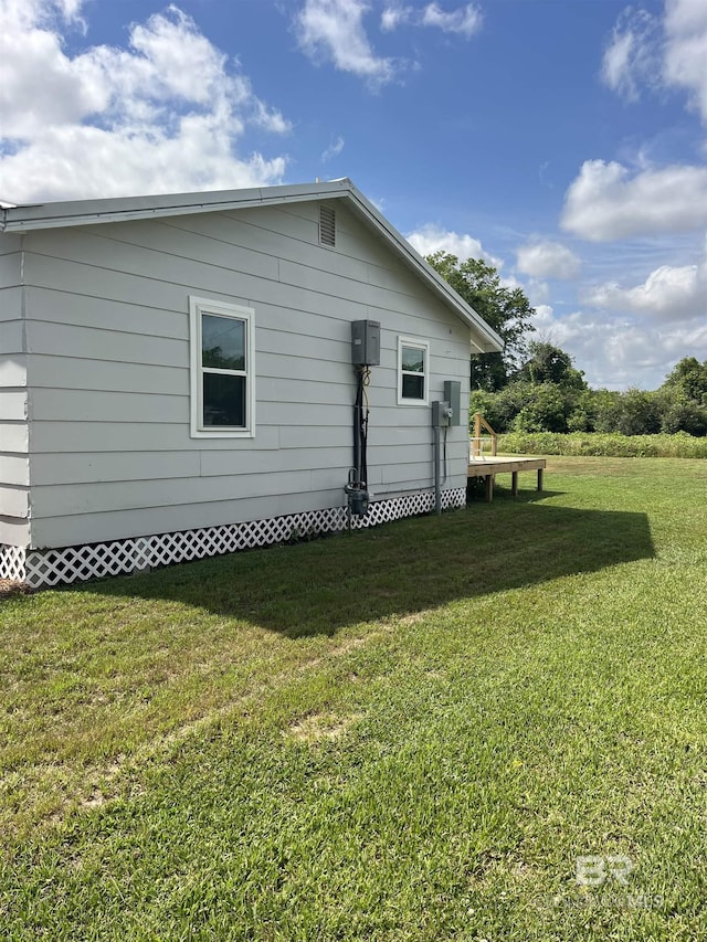 back of house with a yard