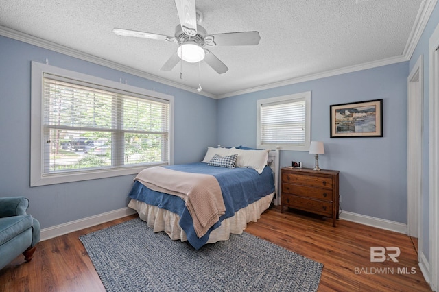 bedroom with ceiling fan, dark hardwood / wood-style floors, and multiple windows