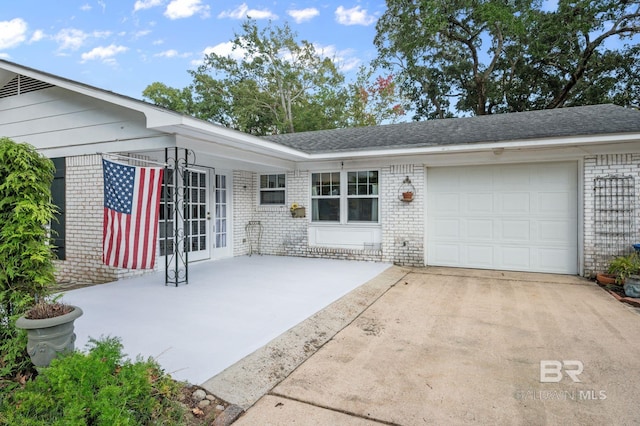 exterior space featuring a garage