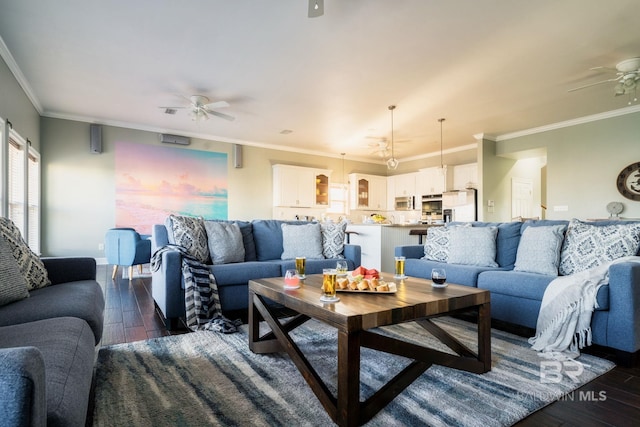 living room featuring dark wood-style floors, baseboards, ceiling fan, and ornamental molding