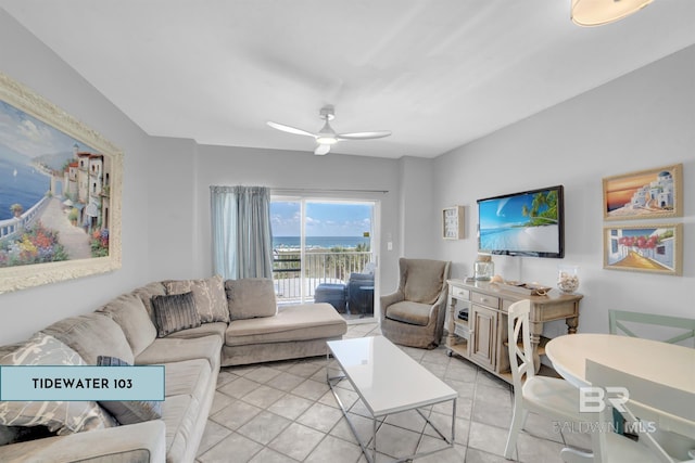 living room with ceiling fan and light tile patterned floors