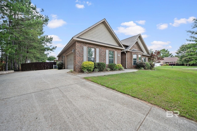 750 Cheswick Ave, Fairhope, AL 36532 - view of front of house featuring brick siding, driveway, and a garage