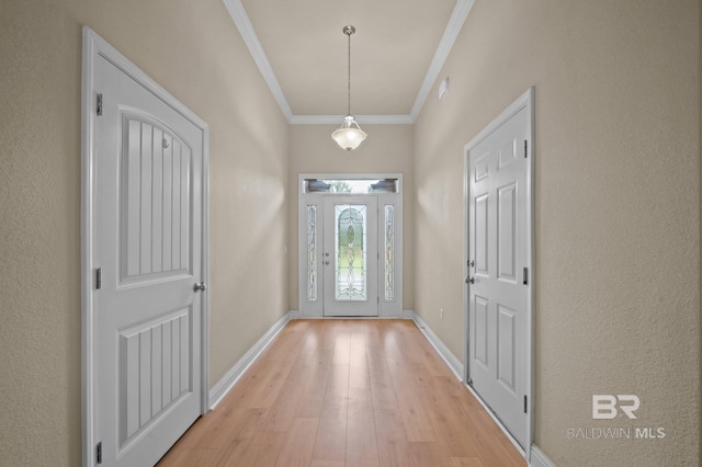 750 Cheswick Ave, Fairhope, AL 36532 - entryway with light wood finished floors, ornamental molding, and baseboards