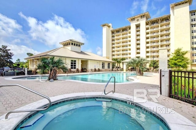 view of swimming pool with a patio area