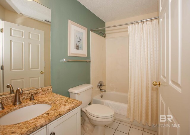 527 Beach Club Trl Unit C1006, Gulf Shores, AL 36542 - bathroom with vanity, shower / tub combo, toilet, a textured ceiling, and tile patterned flooring