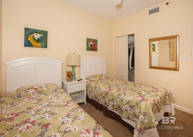 527 Beach Club Trl Unit C1006, Gulf Shores, AL 36542 - bedroom with carpet floors, a closet, ceiling fan, baseboards, and visible vents