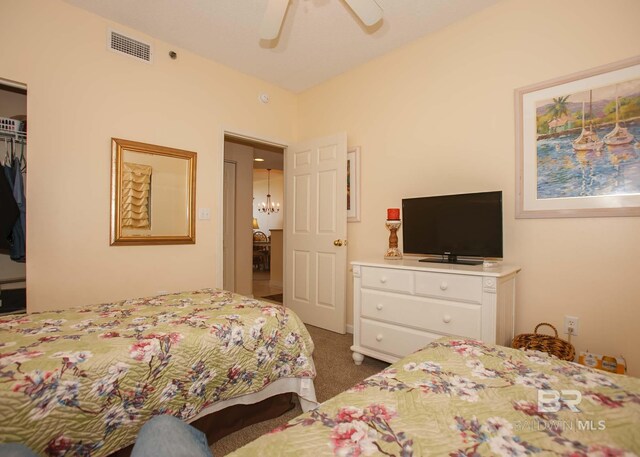 527 Beach Club Trl Unit C1006, Gulf Shores, AL 36542 - bedroom featuring a closet, visible vents, a ceiling fan, and carpet