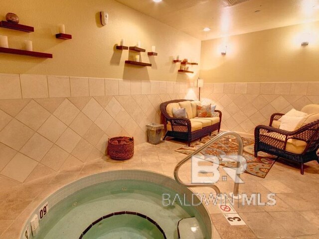 527 Beach Club Trl Unit C1006, Gulf Shores, AL 36542 - interior space featuring tile patterned floors and tile walls