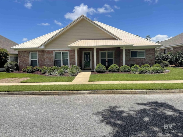 view of front of property with a front yard