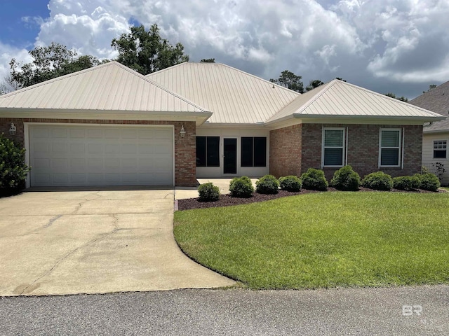 view of front facade with a front lawn and a garage