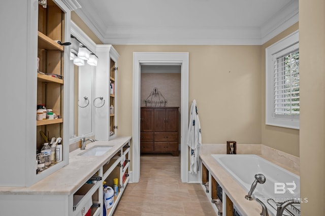 bathroom featuring a bath, vanity, and crown molding