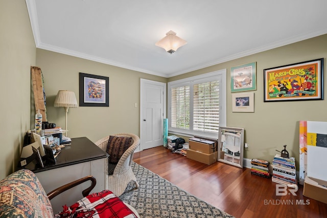 office space featuring crown molding and wood finished floors