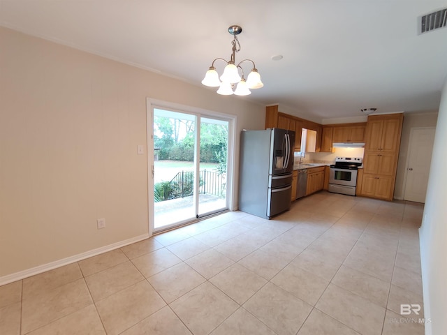 kitchen with decorative light fixtures, light tile patterned floors, stainless steel appliances, and a chandelier