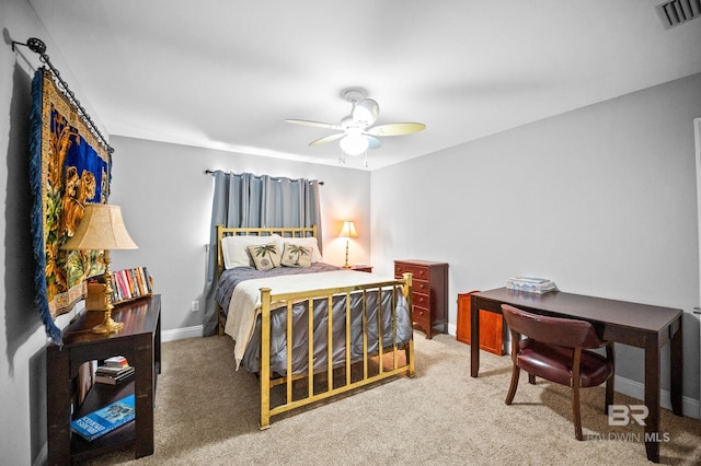 bedroom with carpet, baseboards, visible vents, and a ceiling fan