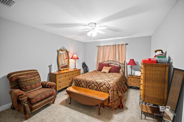 bedroom featuring visible vents and ceiling fan