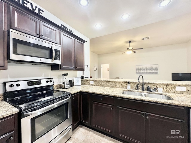 14775 Sonoma Blvd, Silverhill, AL 36576 - kitchen with a ceiling fan, light stone countertops, recessed lighting, a sink, and appliances with stainless steel finishes