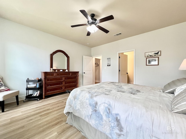 14775 Sonoma Blvd, Silverhill, AL 36576 - bedroom with visible vents, a ceiling fan, and light wood finished floors
