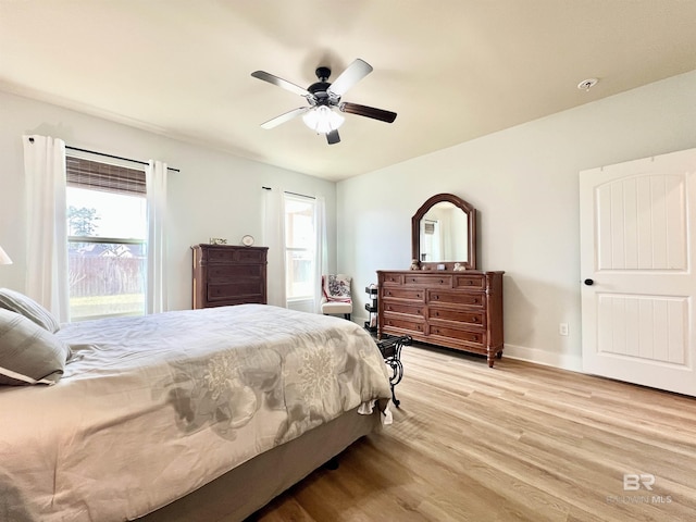 14775 Sonoma Blvd, Silverhill, AL 36576 - bedroom featuring light wood-style flooring, baseboards, and a ceiling fan