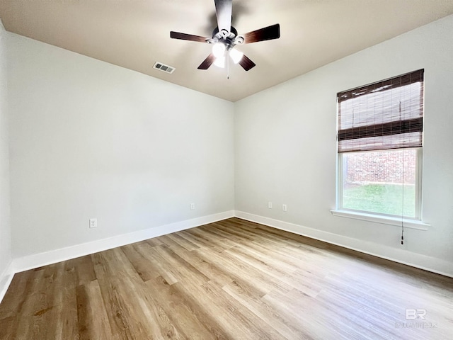 14775 Sonoma Blvd, Silverhill, AL 36576 - unfurnished room featuring visible vents, baseboards, ceiling fan, and wood finished floors