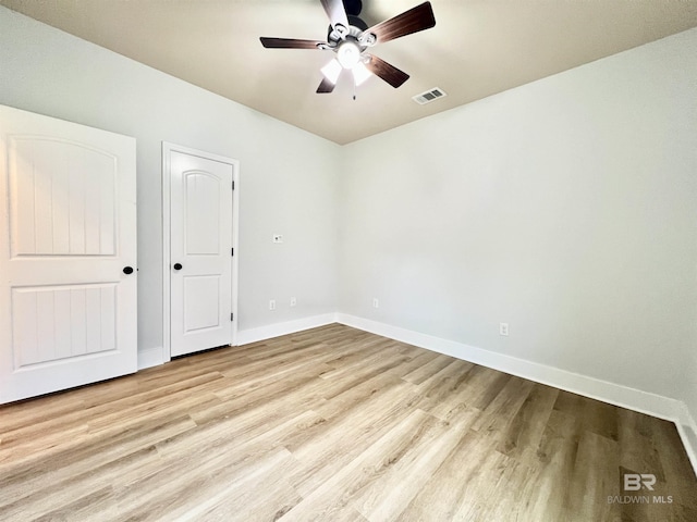 14775 Sonoma Blvd, Silverhill, AL 36576 - unfurnished bedroom with a ceiling fan, baseboards, visible vents, and light wood-type flooring
