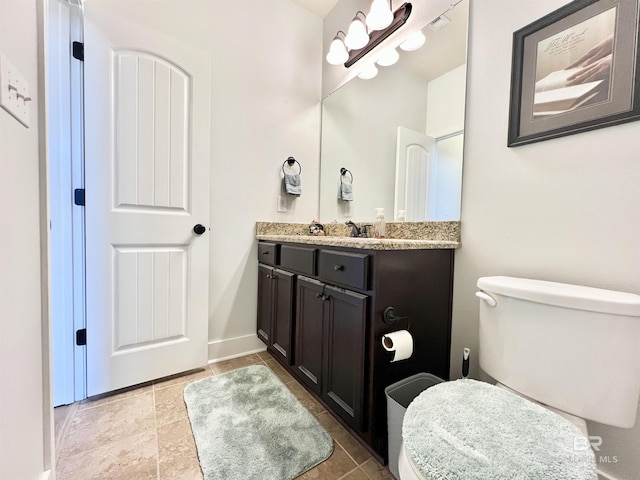 14775 Sonoma Blvd, Silverhill, AL 36576 - bathroom featuring vanity, toilet, and baseboards