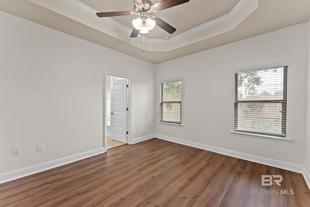 1464 Surrey Loop, Foley, AL 36535 - spare room with ornamental molding, wood finished floors, a raised ceiling, and ceiling fan