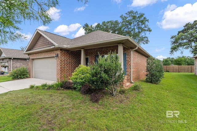 1464 Surrey Loop, Foley, AL 36535 - view of front of house featuring brick siding, an attached garage, and driveway