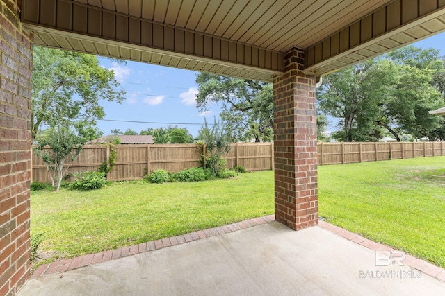 1464 Surrey Loop, Foley, AL 36535 - fenced backyard featuring a patio area