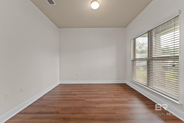 1464 Surrey Loop, Foley, AL 36535 - empty room with baseboards and wood finished floors