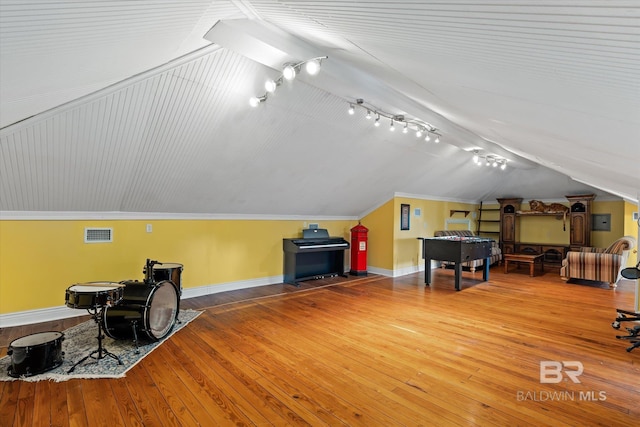 bonus room featuring hardwood / wood-style floors and lofted ceiling