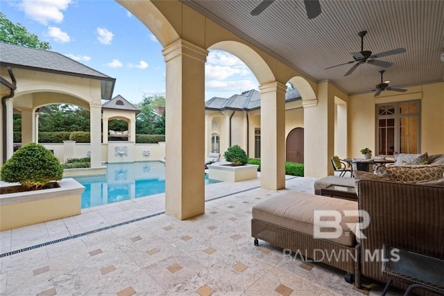 view of patio / terrace with an outdoor hangout area and ceiling fan