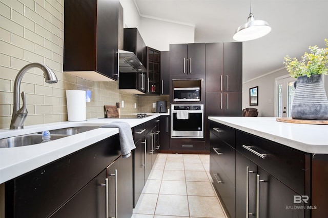 521 Parkwood Ave, Daphne, AL 36526 - kitchen featuring stainless steel appliances, crown molding, decorative backsplash, light countertops, and decorative light fixtures