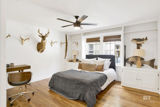 bedroom with wood finished floors