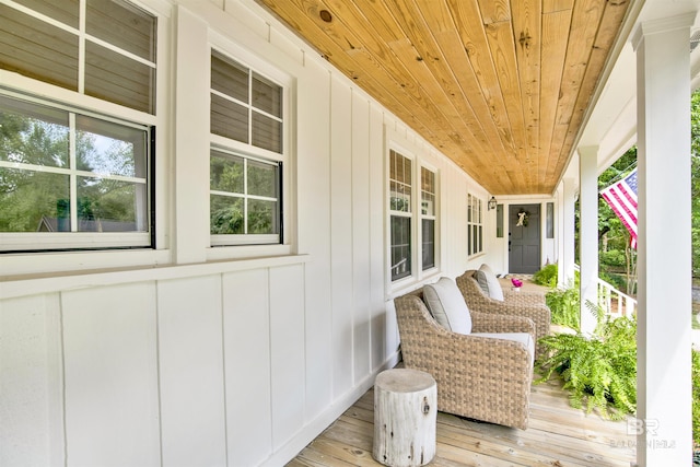 wooden terrace featuring a porch