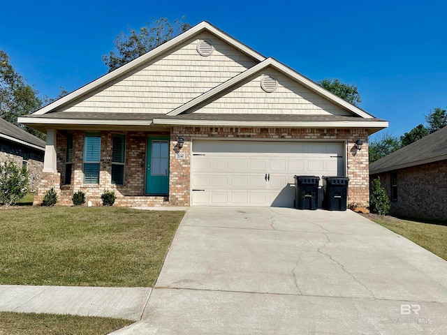 view of front facade with brick siding, a front lawn, an attached garage, and driveway