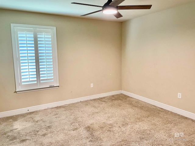 unfurnished room with carpet floors and ceiling fan