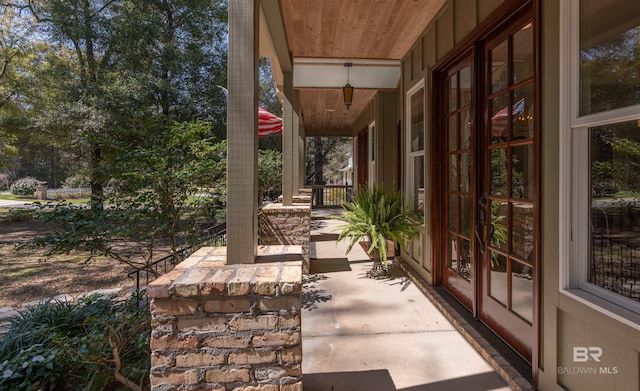 view of patio / terrace with covered porch and french doors