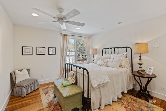 bedroom with recessed lighting, a ceiling fan, baseboards, and wood finished floors