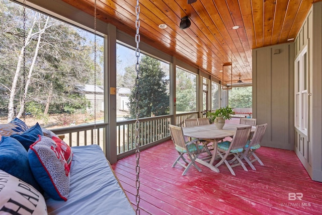 sunroom / solarium with wood ceiling