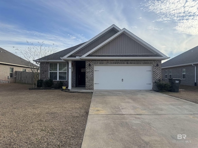 view of front of house with a garage, fence, brick siding, board and batten siding, and concrete driveway