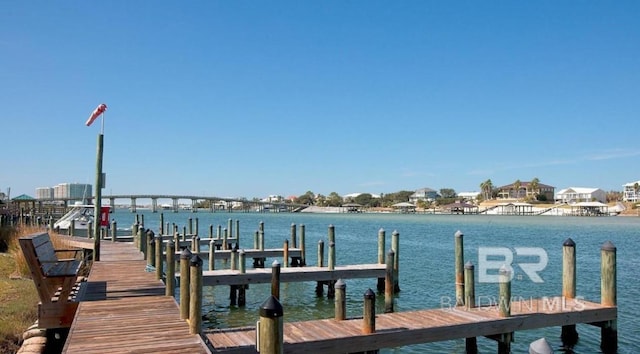 dock area featuring a water view