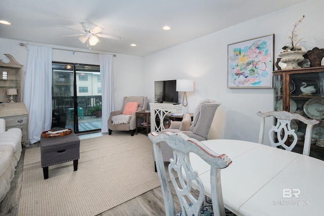 dining space featuring recessed lighting, ceiling fan, and wood finished floors