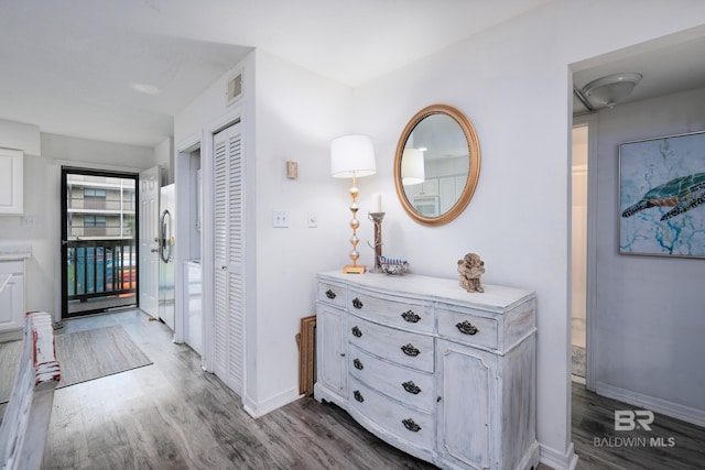 hall featuring hardwood / wood-style floors