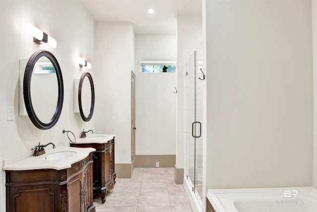 bathroom with plus walk in shower, tile patterned flooring, and dual bowl vanity