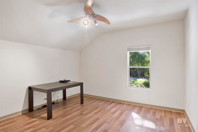 additional living space featuring light wood-type flooring, ceiling fan, and lofted ceiling