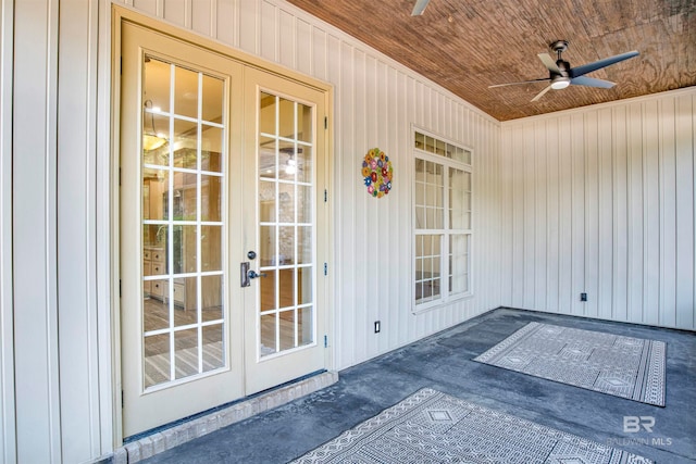 view of exterior entry with ceiling fan